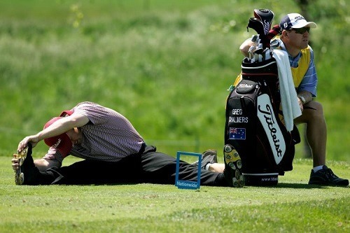 Men Stretches Before Playing Golf